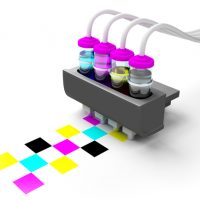 Concept cmyk model. Print cartridge with ink in glass bottles on a white background